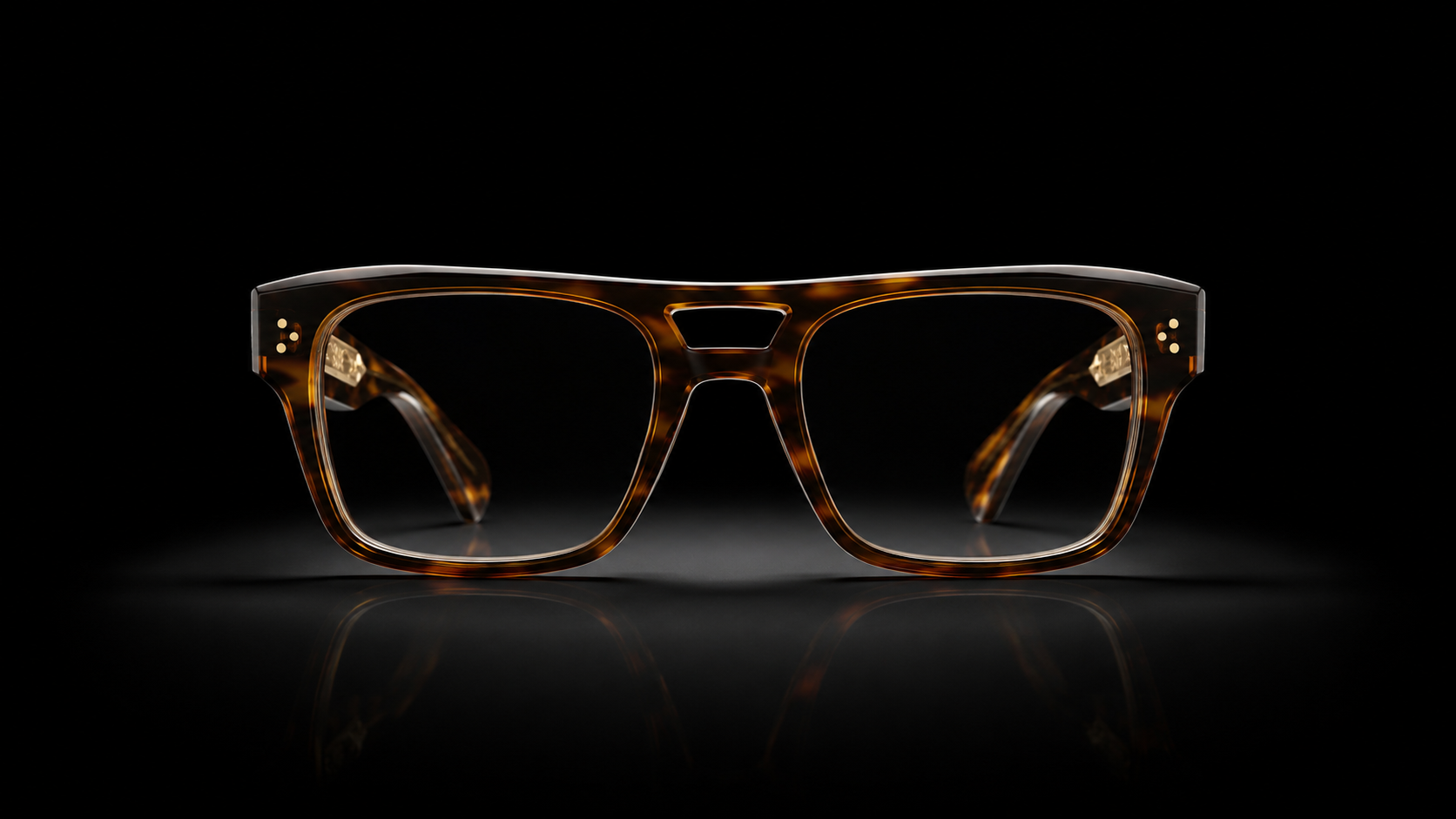 Sculptural eyewear frame, studio-lit on black